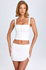 Issa-Curved Low-Rise Mini Skirt in White