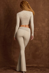 Mairead-Asymmetric Draped Mid-Rise Flared Trousers in Taupe