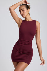 Coa-Modal High-Neck Open-Back Mini Dress in Plum