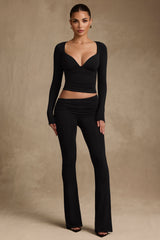 Kalei-Modal Asymmetric-Waist Flared Trousers in Black