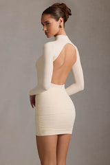 Isolde-Ruched Backless Turtleneck Mini Dress in Ivory