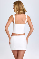 Issa-Curved Low-Rise Mini Skirt in White