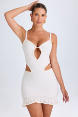 Jovelyn-Ruffle-Appliqué Cut-Out Mini Dress in White