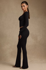 Kalei-Modal Asymmetric-Waist Flared Trousers in Black