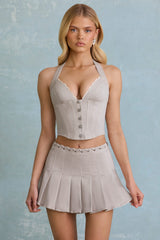 Laika-Low-Rise Pleated Mini Skirt in Ecru