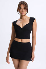 Lyra-Mid-Rise Micro Mini Skirt in Black