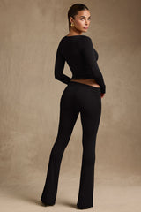 Kalei-Modal Asymmetric-Waist Flared Trousers in Black