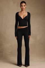 Kalei-Modal Asymmetric-Waist Flared Trousers in Black