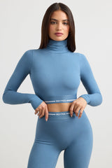 Stretch Cotton Jersey Backless Turtleneck Long-Sleeve Crop Top in Steel Blue