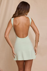 Lidia-High Neck Open Back Mini Dress in Light Sage