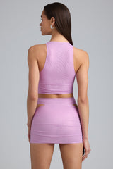 Malika-Metallic Cut-Out Low-Rise Mini Skirt in Violet Pink