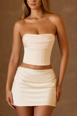 Kimi-Draped Mid-Rise Mini Skirt in Ivory