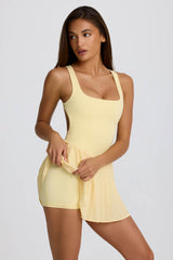 Soft Active Open-Back Pleated Tennis Dress in Lemon