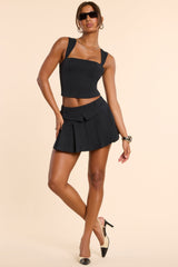 Maize-Brushed Twill Mid Rise Pleated Micro Mini Skirt in Black