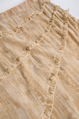 Novina-Ruffled Asymmetric Mid-Rise Maxi Skirt in Tan Print