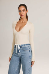 Elodie-Modal Plunge Long-Sleeve Bodysuit  in Ivory