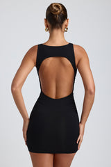 Coa-Modal High-Neck Open-Back Mini Dress in Black