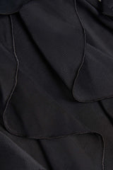 Felicity-Ruffled Mid-Rise Flared Trousers in Black
