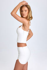 Issa-Curved Low-Rise Mini Skirt in White